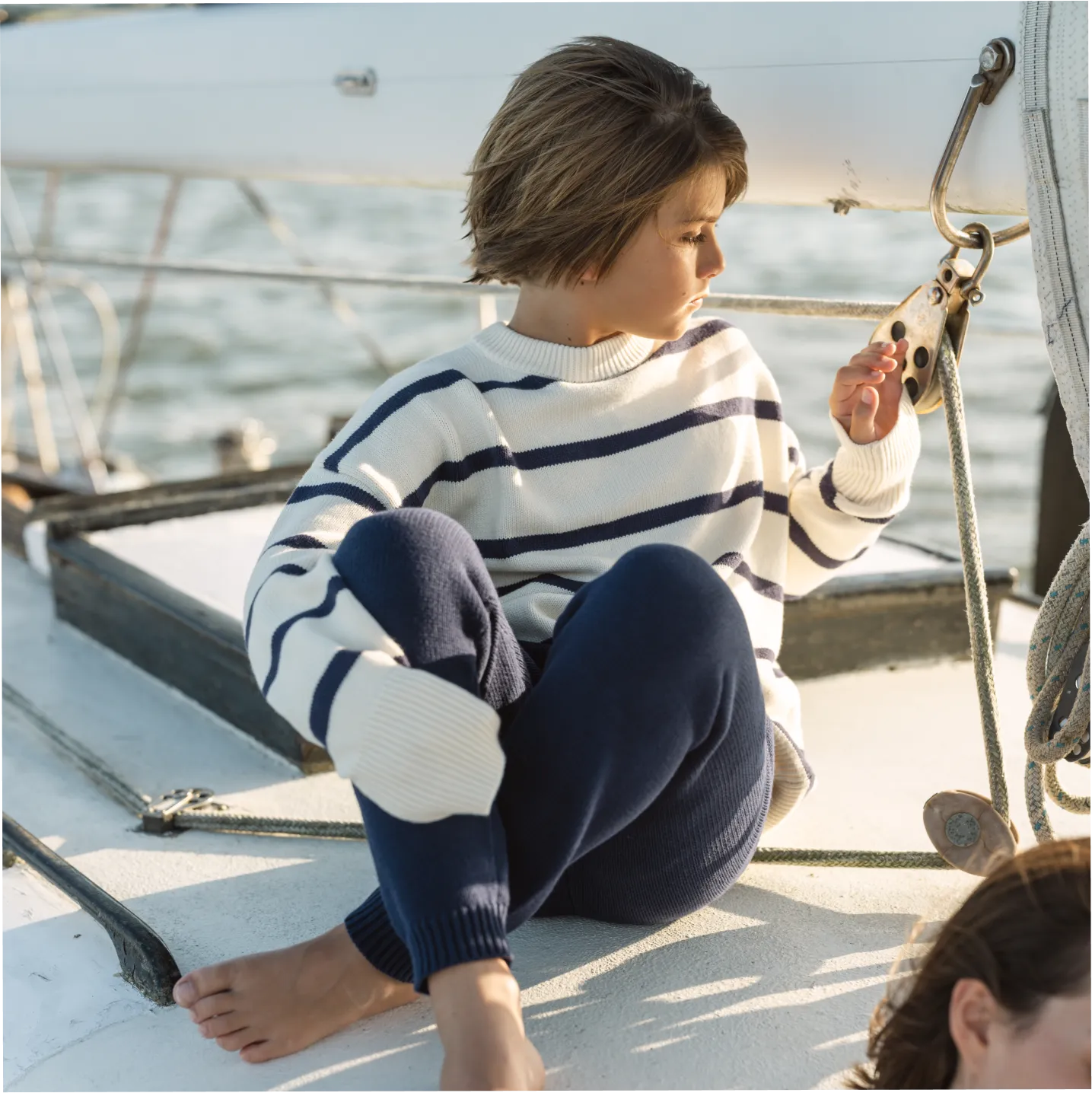 unisex cream and navy wide stripe knit sweater